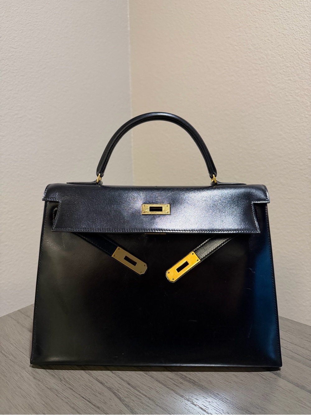 HERMÈS Box Kelly Retourne 32 Noir Box Leather Gold Hardware Handbag